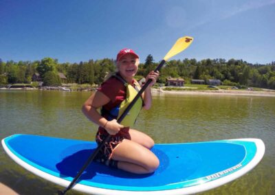 happy paddle boarder